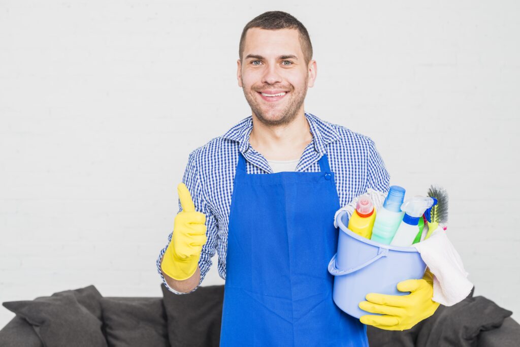 portrait man cleaning his house